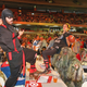 Illustration for article titled Rioting Costumed Fans Halt Australian Darts Competition